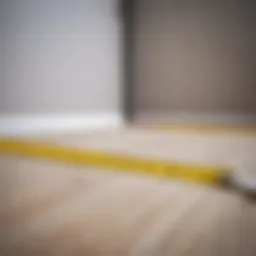 Measuring tape laid out in a room corner