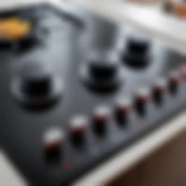 Close-up of control knobs and settings on a modern cooktop